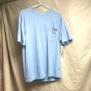 I’m selling a baby blue wrangler workwear tee shirt with tags still on it.